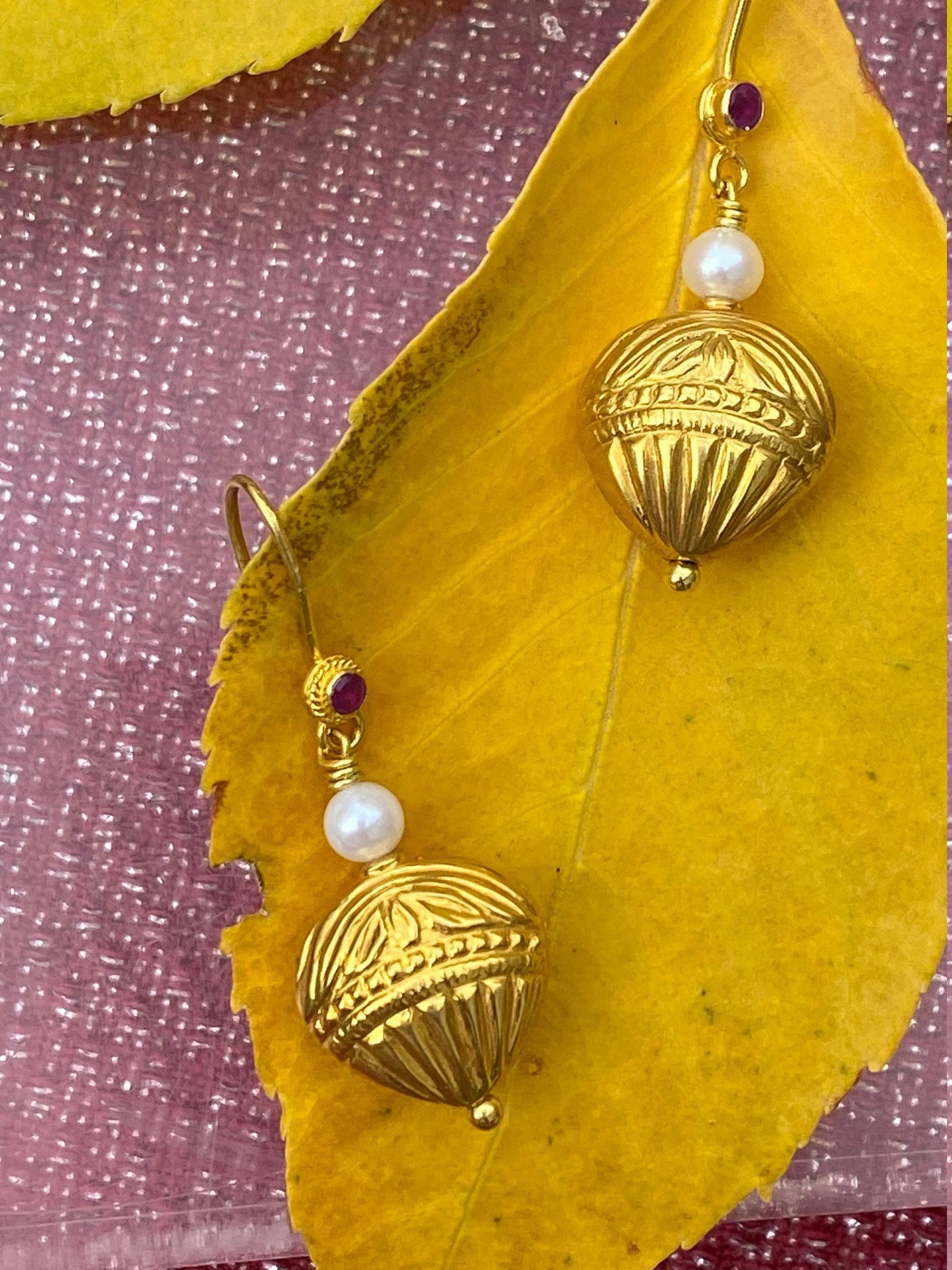 18KY gold earrings with natural round ruby accents and pearls