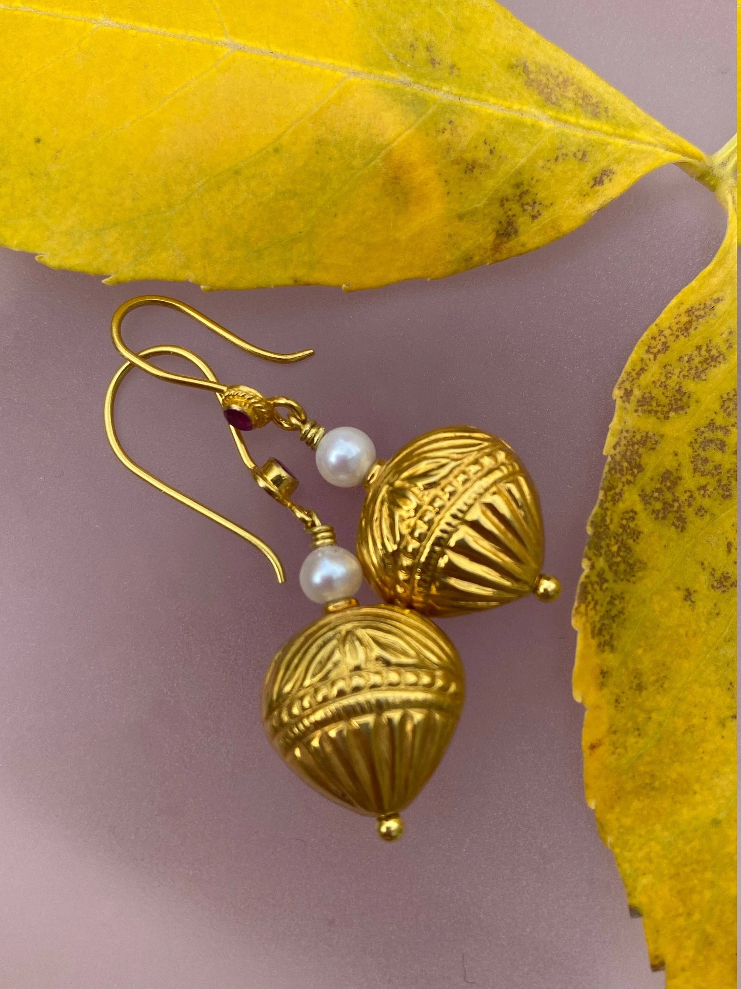 18KY gold earrings with natural round ruby accents and pearls