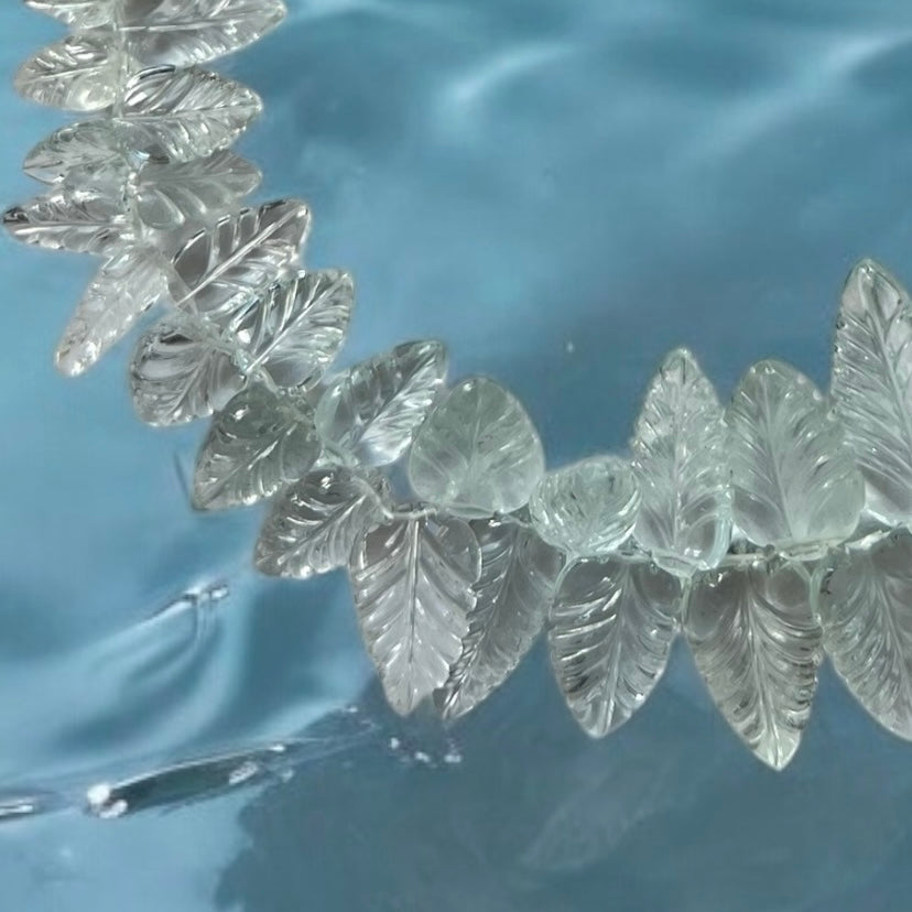 Carved Aquamarine leaf necklace with 14KY gold filigree clasp