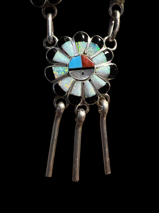 Native American Woman Sterling silver, synthetic opal, turquoise, onyx and coral 'Sunface' Zuni necklace