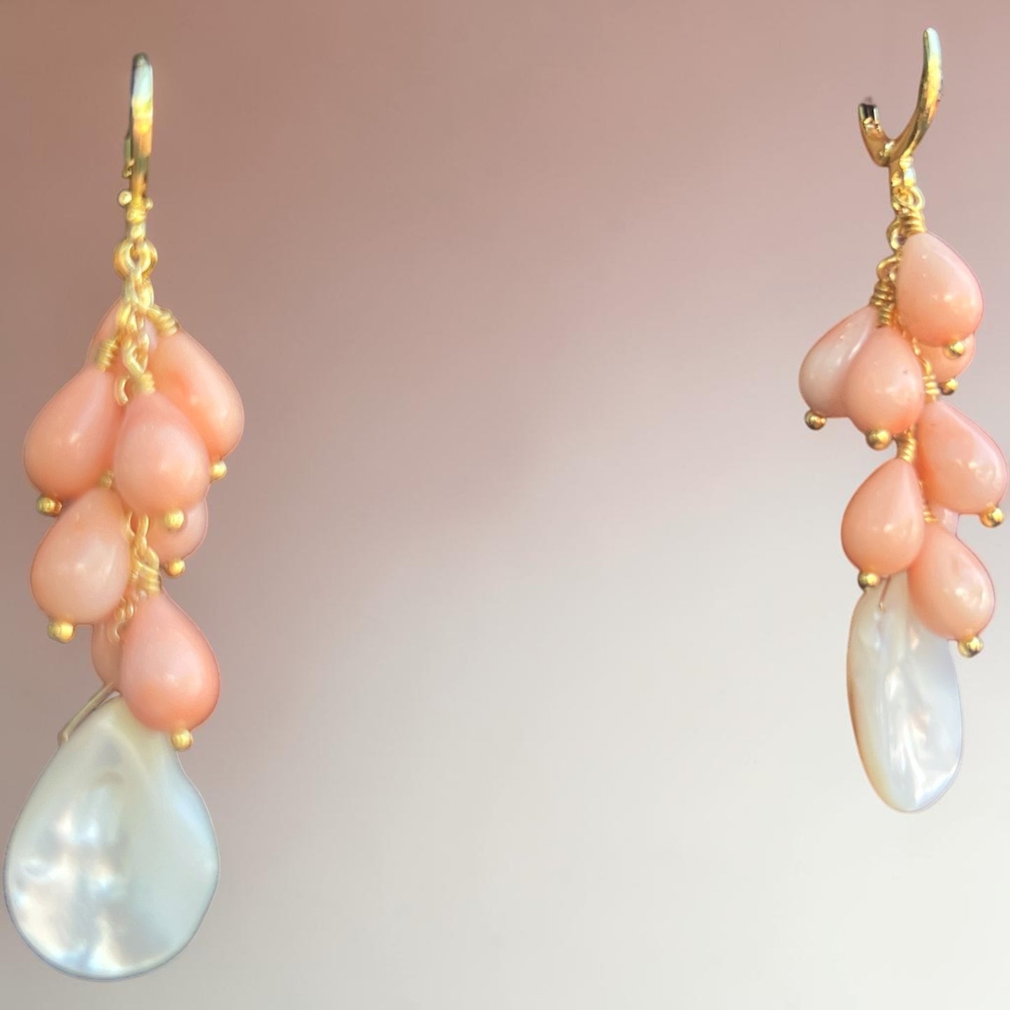 Earrings with gold fill hoops and angel skin coral drops with mother of pearl teardrop