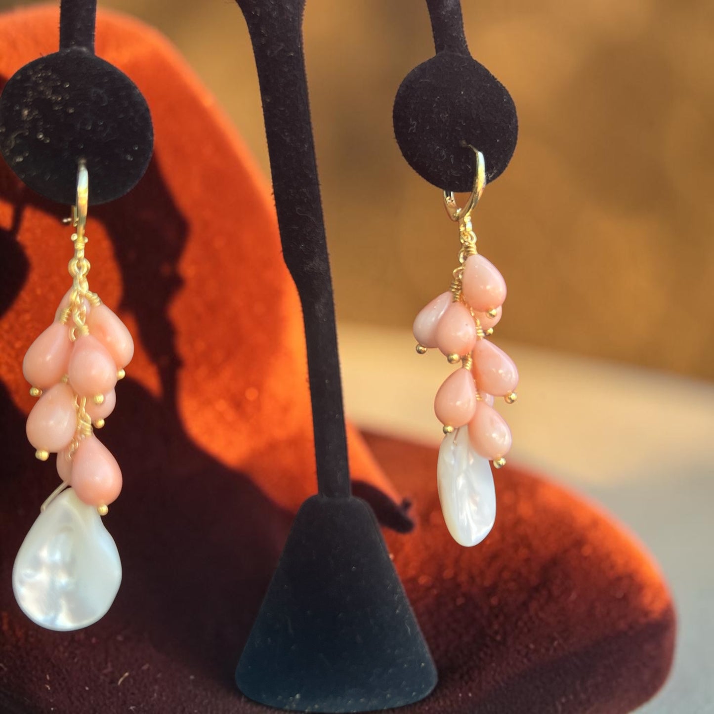 Earrings with gold fill hoops and angel skin coral drops with mother of pearl teardrop