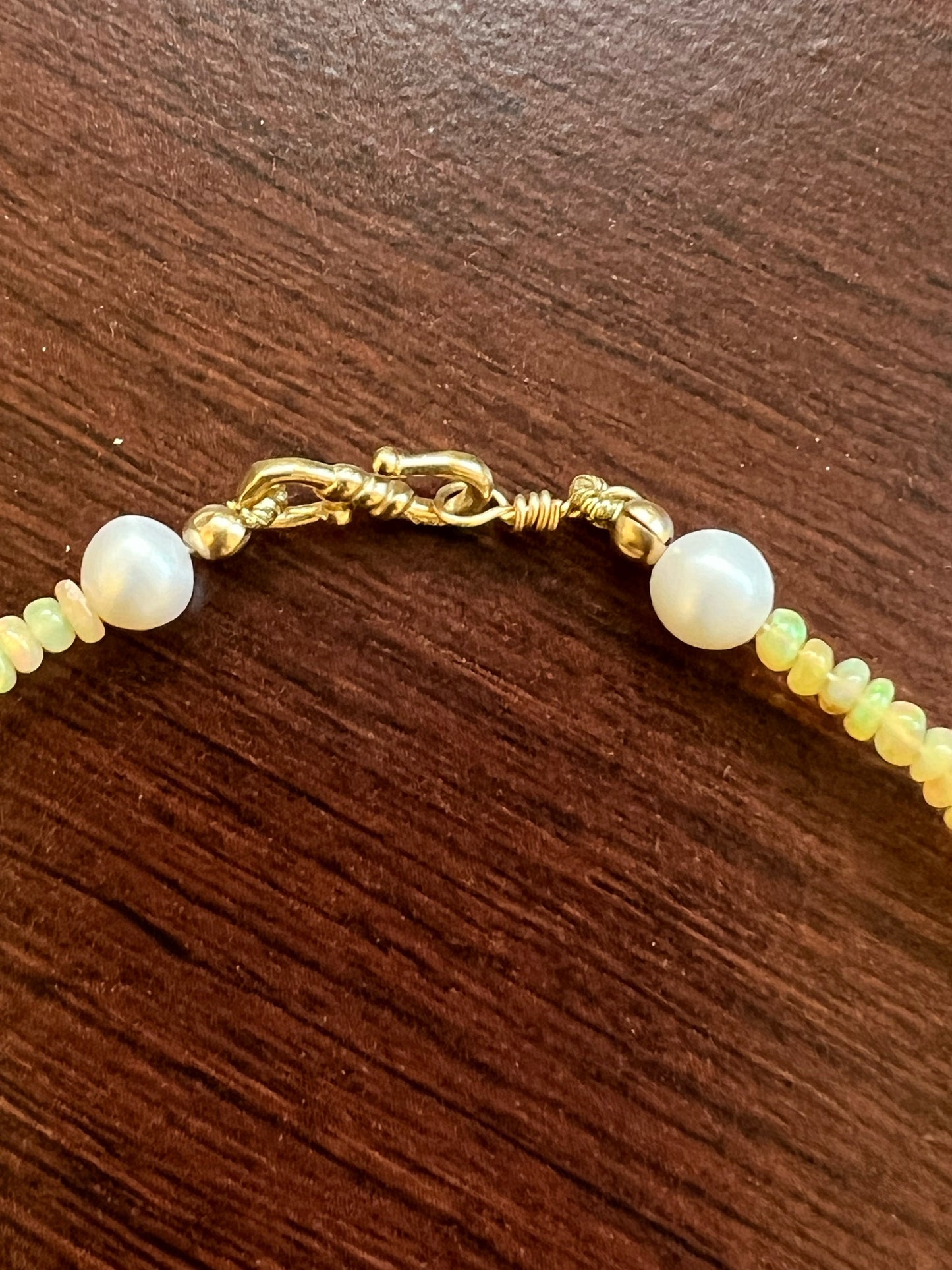 Ethiopian Opal graduated bead necklace with 18KY gold 'S' clasp and cultured pearls